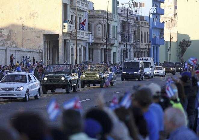 Military vehicles transport the ashes of Cuba's late President Fidel Castro in Havana