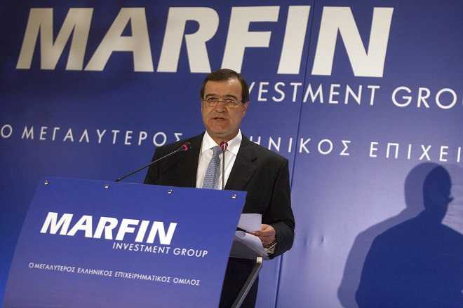 Marfin Investment Group (MIG) Chairman Andreas Vgenopoulos addresses journalists during news a conference in Athens, June 22, 2009. As Greeks head back to the polls in an election that may help to decide whether they stay in Europe's common currency, and as Cypriot politicians move closer to asking for an international bailout - perhaps as early as this week - the story of Vgenopoulos and Marfin helps explain how Greece and Cyprus got here. Picture taken June 22, 2009. To match Special Report GREECE/MARFIN REUTERS/Icon (GREECE - Tags: BUSINESS) - RTR33J6J